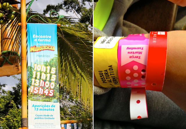 Placa indicando os horários para encontrar os personagens do Madagascar na área temática. E ainda: a pulseira de ingresso, pulseira do fast pass e pulseira que indica a altura já que alguns brinquedos não permitem crianças menores de 1,10m